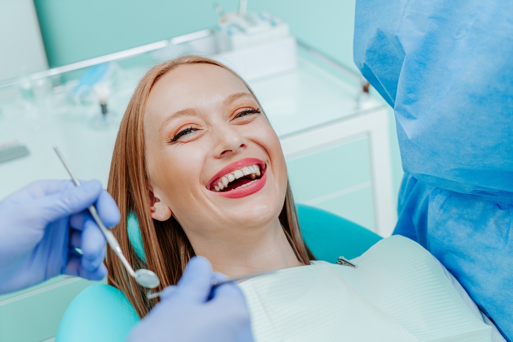 Happy female dental patient - Dentist in Lynnwood WA Happy female dental patient - Dentist in Lynnwood WA