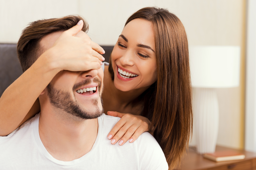 Couple playfully smiling - Dental Crown in Lynnwood Couple playfully smiling - Dental Crown in Lynnwood