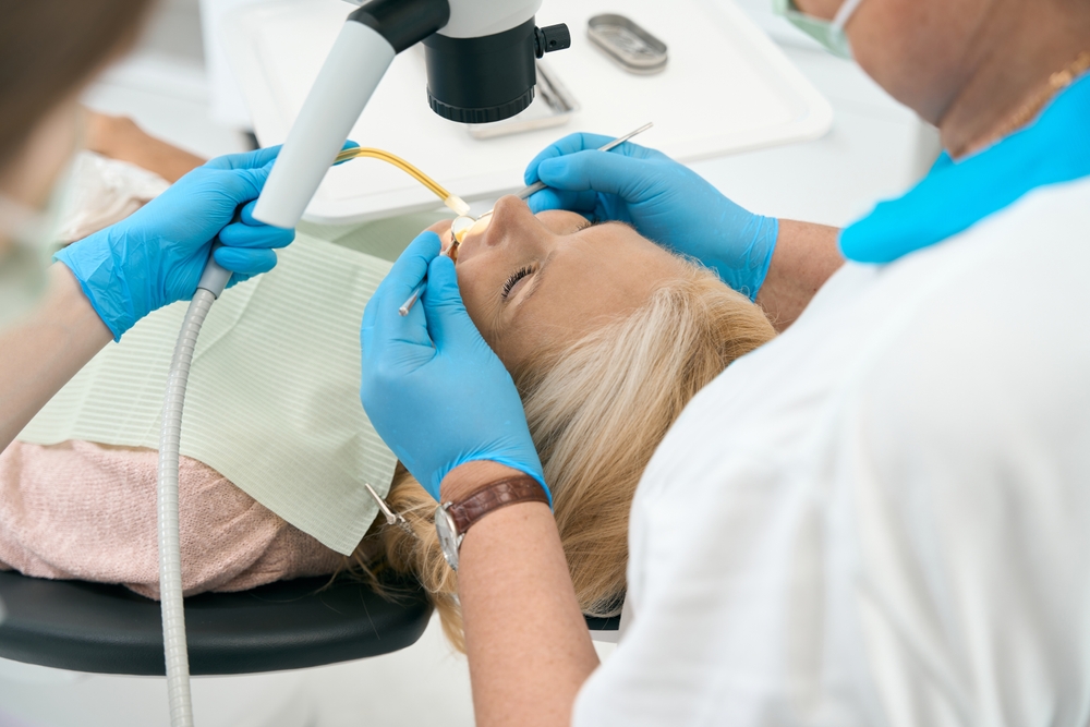 Woman having a Tooth Extraction in Bellevue