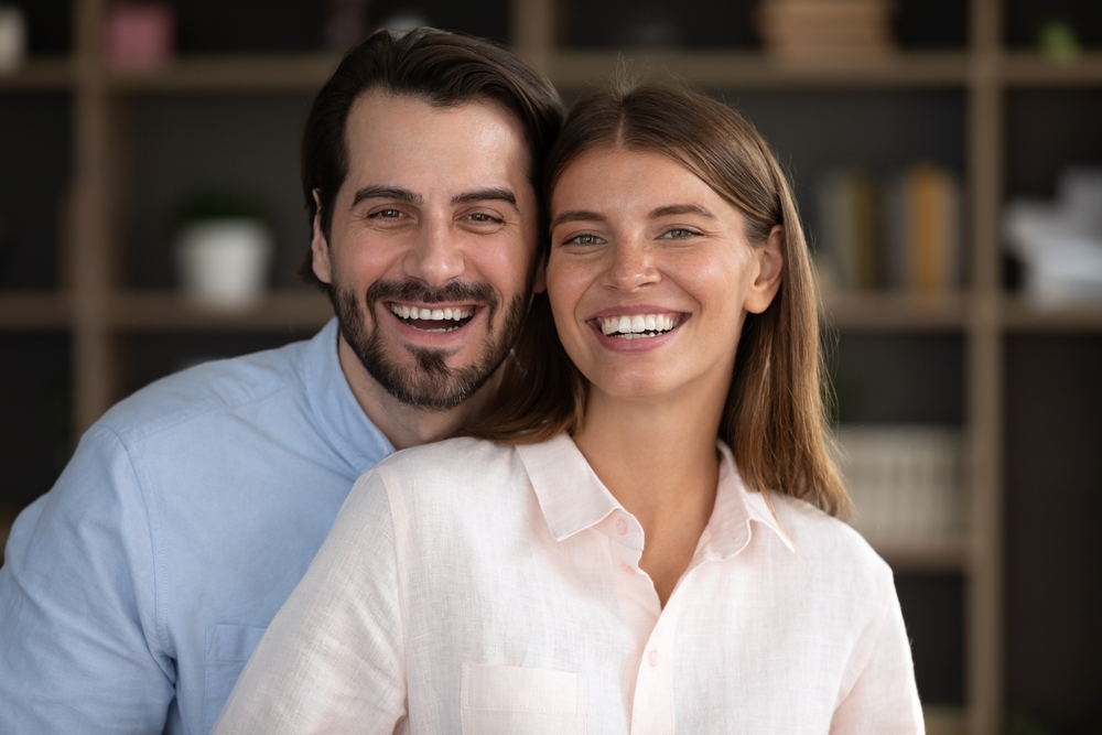 Couple with great teeth smiling - Dental Bonding Couple with great teeth smiling - Dental Bonding