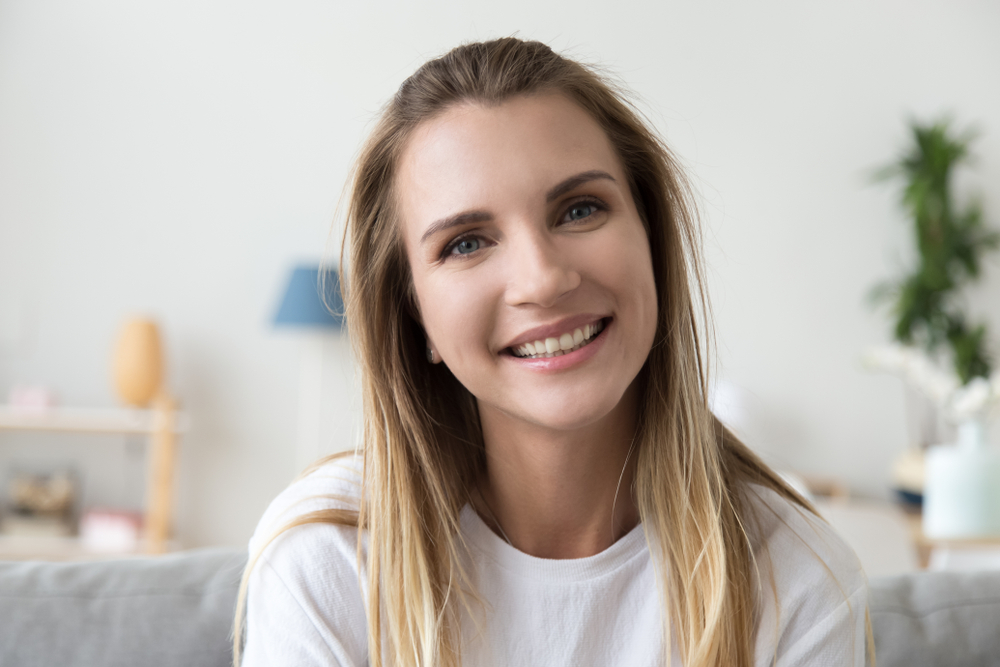 Smiling woman with perfect teeth - Root Canal in Bellevue Smiling woman with perfect teeth - Root Canal in Bellevue