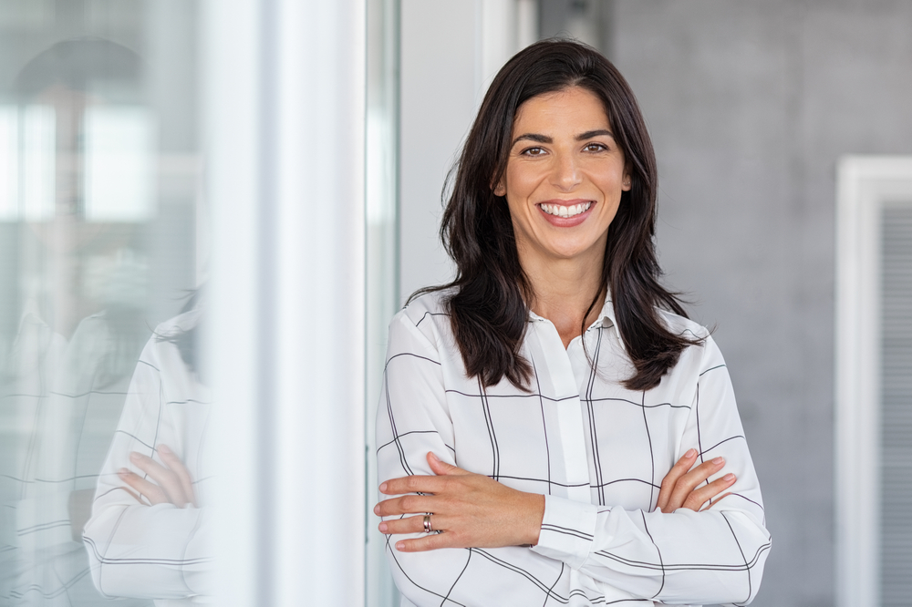 Woman posing for a portrait - dental implants Woman posing for a portrait - dental implants